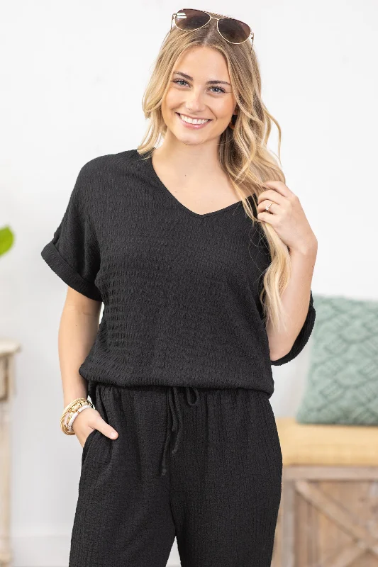 women's tops for those who want to elevate their everyday wear with chic and elegant piecesBlack Textured Rolled Sleeve Knit Top